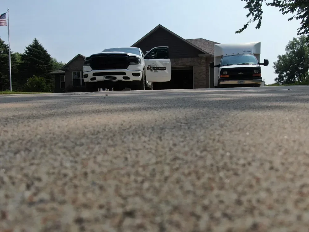BN Exteriors work truck and trailer at a jobsite
